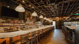 Foto von Lucille's Dix30 Restaurant