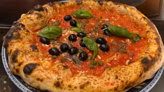 A photo of Enzos Pizzabar restaurant