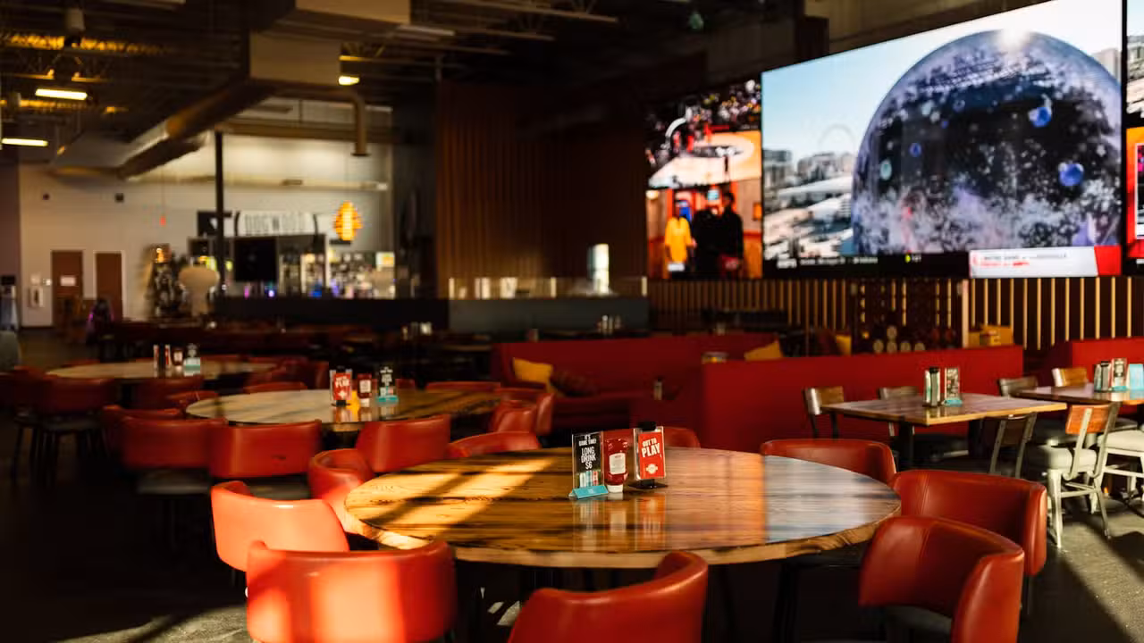 Dining Room Seating Area Near LED TV Wall - Dogwood Social House O'Fallon, MO, O'Fallon, MO