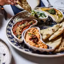 A photo of Neos Americana restaurant