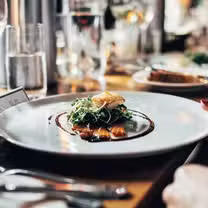 A photo of Plates at 208 restaurant