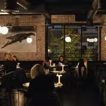 A photo of Kiss & Tell restaurant
