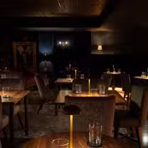 A photo of None of the Above restaurant