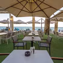 Una foto del restaurante Flamingo Paradise Beach Restaurant