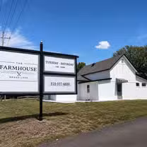 Una foto del restaurante The Farmhouse