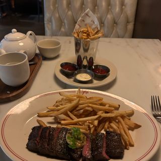 le âme dress code for ladies Parisian Steakhouse at The Global Ambassador Restaurant - Phoenix, AZ le ame bar table