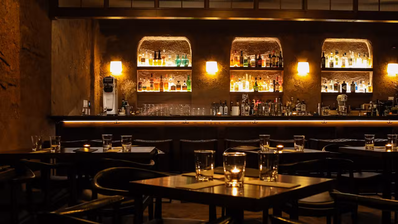 Dim-lit, hidden speakeasy wine and cocktail bar - Le Mistral, Chicago, IL