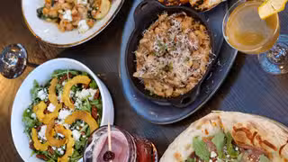 Una foto del restaurante Woodie Fisher Kitchen + Bar
