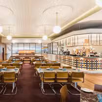 A photo of The Statesman Hotel - Policy Dining restaurant